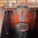 Open Ayurvedic steam box with seat and head opening during Panchakarma retreat in Kerala